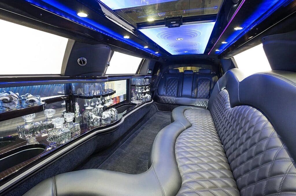 A limo with leather seats and blue lights
